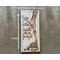 Giraffe nursery wall decor. A giraffe mother kisses a baby giraffe's head. This wood wall art is 20 by 10 inches.